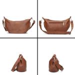 Mademoiselle.M M70 Half-Moon Bag Cognac